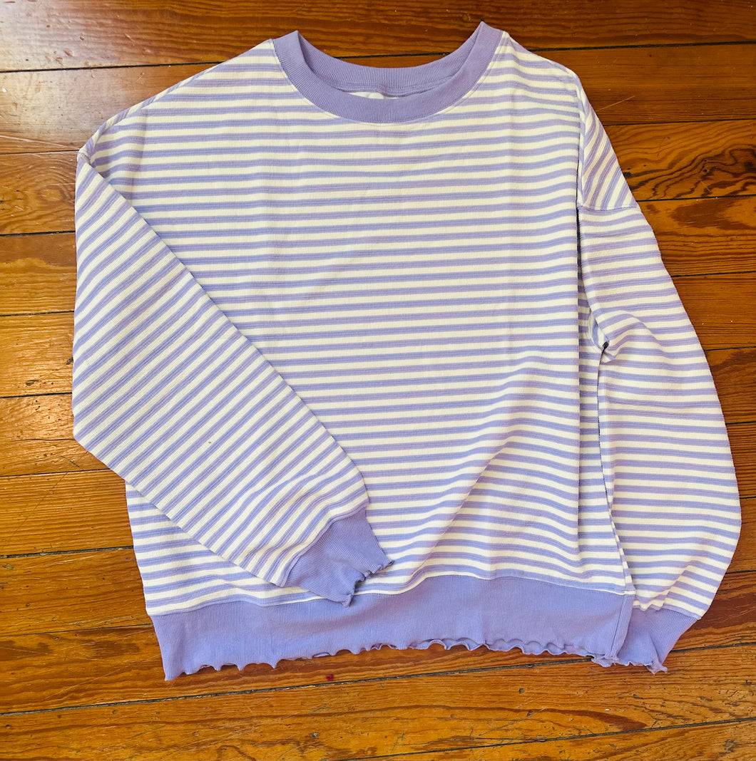 Purple over white sweater